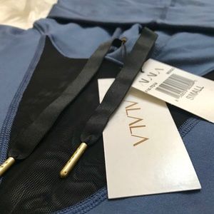 Never worn ALALA hooded long sleeve